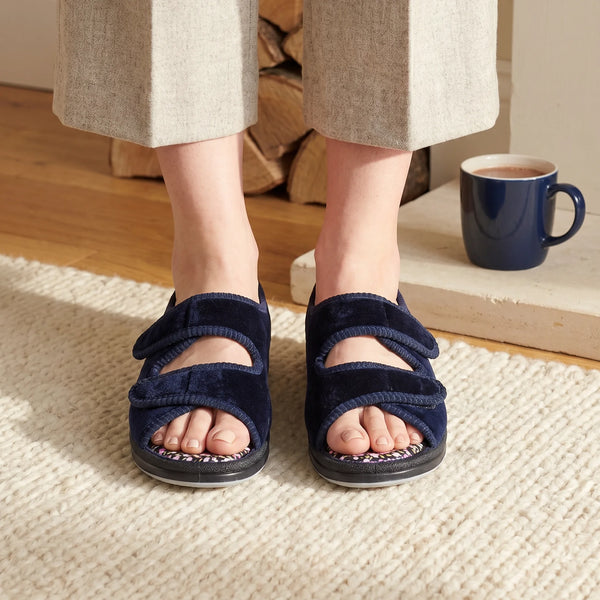 Entice Slippers in Navy, in a styled scene at home